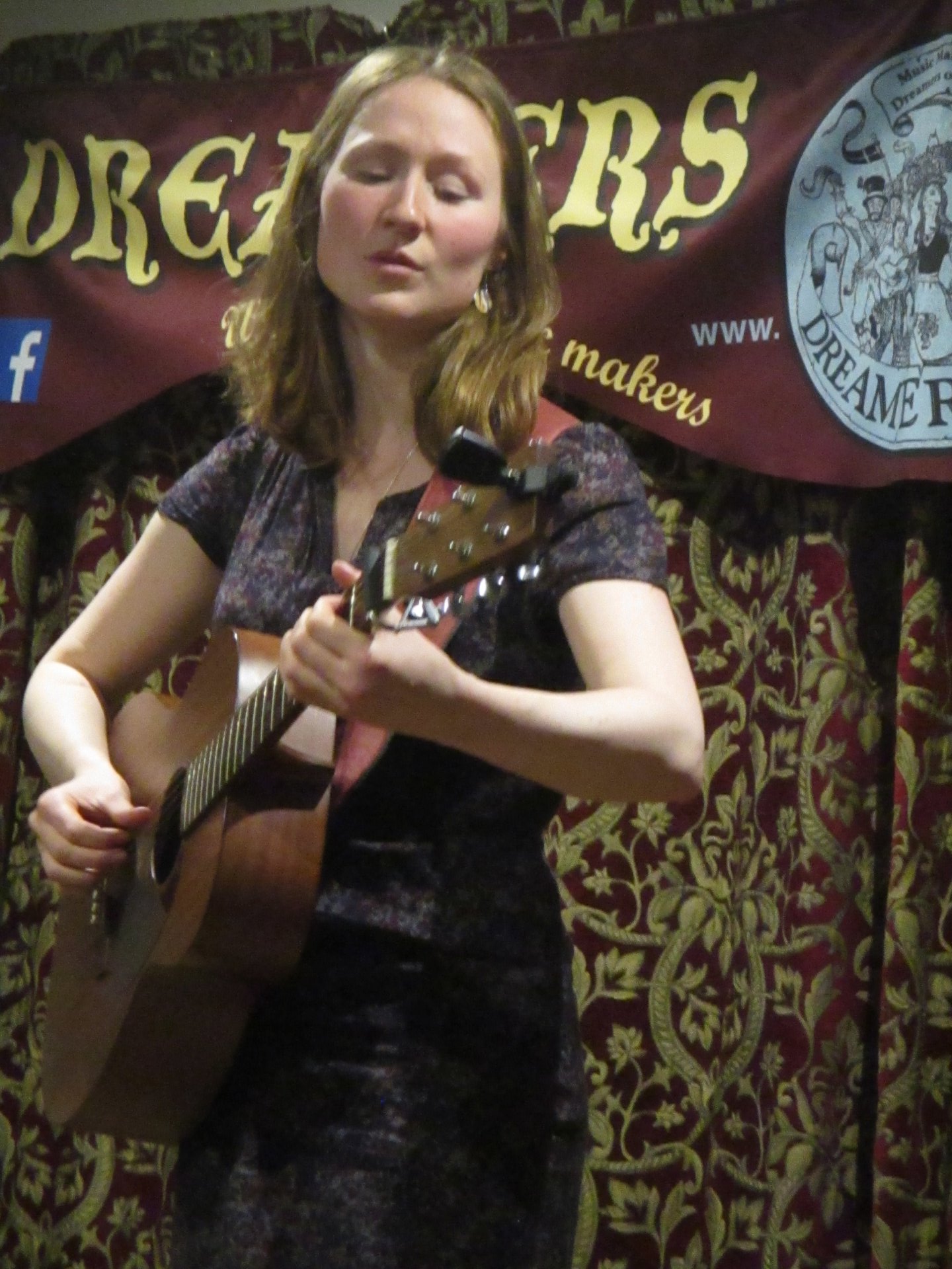 Saskia playing guitar